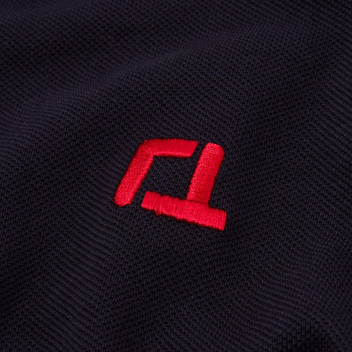 Quantock Polo in Navy with Red Motif